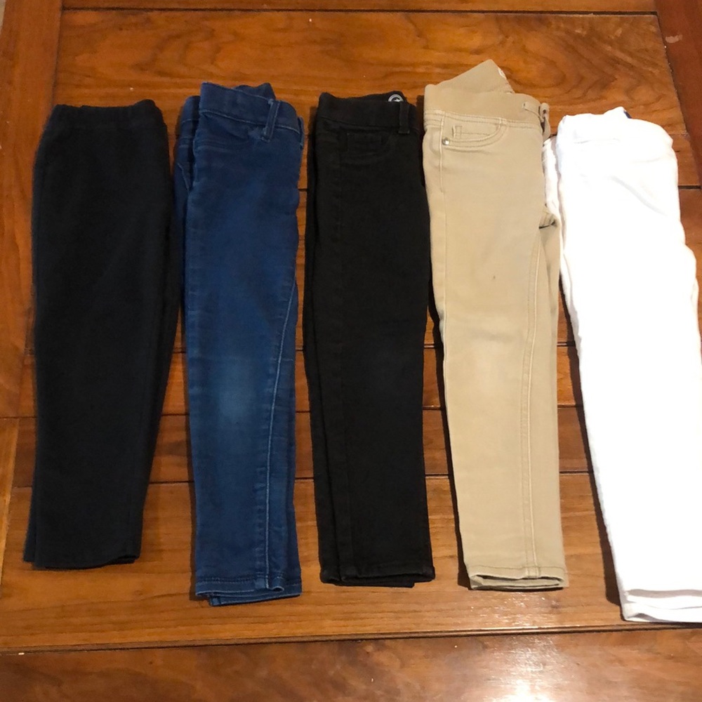 Girls black white denim and khaki pants and all size 4,5, they all fit the same